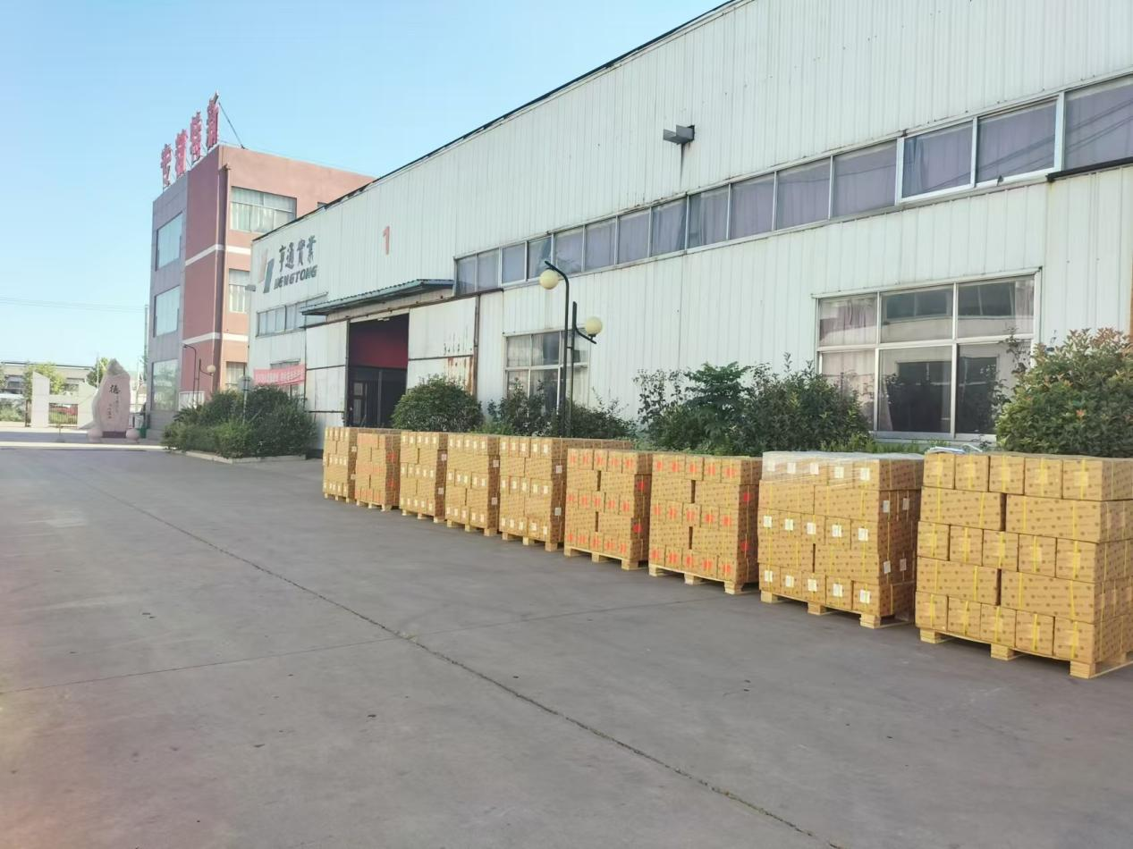 It's a busy day of loading brake lining container